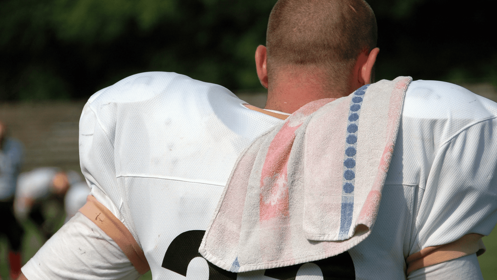 Why Do Football Players Wear Towels
